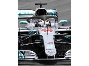 Mercedes driver Lewis Hamilton of Britain steers his car during the qualifying session at the Hockenheimring racetrack in Hockenheim, Germany, Saturday, July 21, 2018. The German Formula One Grand Prix will be held on Sunday, July 22, 2018.