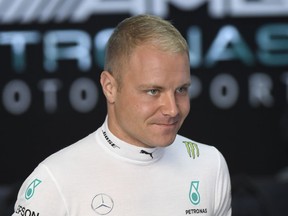 Mercedes driver Valtteri Bottas of Finland prepares at pits during the first free practice at the Hockenheimring racetrack in Hockenheim, Germany, Friday, July 20, 2018. The German Formula One Grand Prix will be held on Sunday, July 22, 2018.