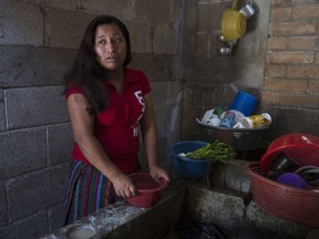 Paulina Gutierrez Alonzo, a 26-year-old Quiche indigenous woman, answers questions during an interview at her grandfather's house in Joyabaj, Guatemala, Thursday, July 26, 2018. Gutierrez Alonzo was deported from United States in June and separated from her 7-year-old daughter Antonia Yolanda Gomez Gutierrez, who is currently at an immigration center in Arizona, despite the Thursday deadline for reuniting children with their families who were caught entering the country without authorization.
