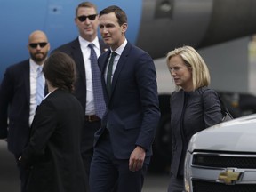 White House Senior Adviser Jared Kushner, center, and Homeland Security Secretary Kirstjen Nielsen, arrive at the Benito Juarez International Airport in Mexico City, Friday, July 13, 2018. Kushner and Nielsen are part of a Cabinet-level delegation accompanying Secretary of State Mike Pompeo on his visit to Mexico on the heels of their sea-change election that could offer a chance for the neighbors to repair strained relations.