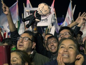 Supporters pack Mexico City's main square, the Zocalo, as Presidential candidate Andres Manuel Lopez Obrador delivers his victory speech, Monday, July 2, 2018. Lopez Obrador has claimed victory in Mexico's presidential election, calling for reconciliation.