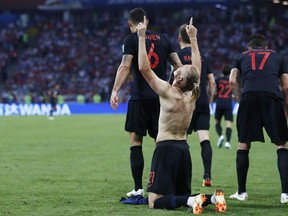 Croatia's Domagoj Vida celebrates after scoring his side's second goal during the quarterfinal match between Russia and Croatia at the 2018 soccer World Cup in the Fisht Stadium, in Sochi, Russia, Saturday, July 7, 2018.