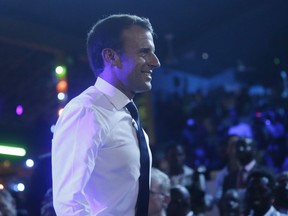 French President Emmanuel Macron arrive for an event to celebrate African Culture at the New Afrika shrine in Lagos, Nigeria, Tuesday, July 3, 2018. Macron arrived Abuja earlier for a meeting with his Nigerian counterpart Muhammadu Buhari, in his latest attempt to forge closer ties with English-speaking Africa.
