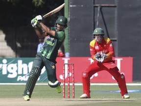 Pakistan batsman Fakhar Zaman plays a shot during the T20 cricket match against Zimbabwe at Harare Sports Club, Sunday, July 1, 2018.  Zimbabwe is playing host to a tri-nation Twenty20 international series with Australia and Pakistan.