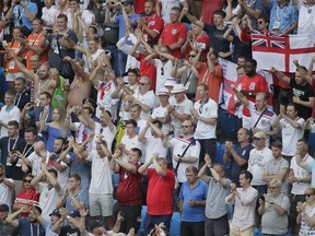 English fans applaud their players after the third place match between England and Belgium at the 2018 soccer World Cup in the St. Petersburg Stadium in St. Petersburg, Russia, Saturday, July 14, 2018. Belgium defeats England 2-0.