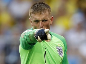 England goalkeeper Jordan Pickford gestures during the quarterfinal match between Sweden and England at the 2018 soccer World Cup in the Samara Arena, in Samara, Russia, Saturday, July 7, 2018.