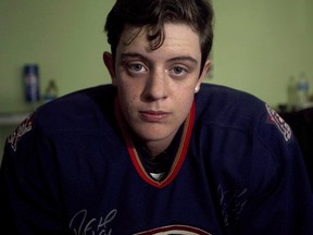 Jesse Thompson, 17, poses for a photograph in his room in Oshawa, Ont., on Monday, Sept.15, 2014.