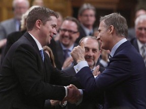 Maxime Bernier with Conservative Leader Andrew Scheer in the House of Commons during Question Period on Parliament Hill in Ottawa, Monday, May 29, 2017.