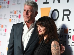 In this file photo taken on April 13, 2018 Chef Anthony Bourdain and actor Asia Argento attend the 2018 Women In The World Summit at Lincoln Center in New York City.