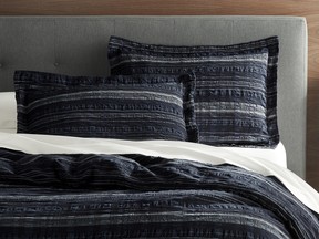 This bedding references early 20th century Japanese folk art as well as Scandinavian sensibilities. It's part of a growing trend toward mixing not only materials, but eras, to create contemporary looks.