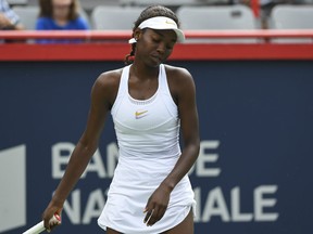 Francoise Abanda of Canada reacts after losing a point against Sloane Stephens during their match at the Rogers Cup at IGA Stadium in Montreal on Wednesday.