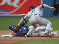Russell Martin of the Blue Jays is caught trying to steal second base as he is tagged out by Joey Wendle of the Tampa Bay Rays in the seventh inning on Saturday night at Rogers Centre in Toronto.
