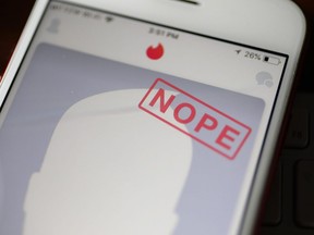 In this photo illustration, the dating app Tinder is seen on the screen of an iPhone on August 14, 2018 in Miami, Florida.
