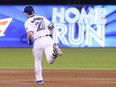 Billy McKinney of the Blue Jays circles the bases on his solo home run in the fifth inning against the Baltimore Orioles at Rogers Centre in Toronto on Tuesday night. It was McKinney's first career major league homer.