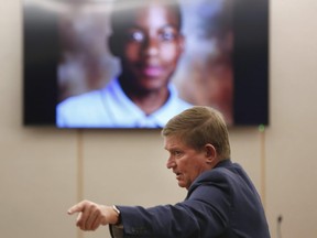 Lead prosecutor Michael Snipes points to the family of Jordan Edwards during his closing argument during the eighth day of the trial of fired Balch Springs police officer Roy Oliver, who is charged with the murder of 15-year-old Jordan Edwards, at the Frank Crowley Courts Building in Dallas, Texas on August 27, 2018.