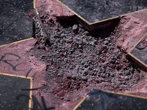 Rubble remains in the place where the star of U.S. President Donald J. Trump on the Hollywood Walk of Fame was destroyed by a vandal in the early morning hours on July 25, 2018 in Los Angeles, California.