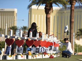 Fifty-eight white crosses for the victims of Sunday night's mass shooting o the Las Vegas Strip just south of the Mandalay Bay hotel in Las Vegas, Nevada. No motive has yet been determined for last year's massacre of 58 people at an outdoor country music concert in Las Vegas, the deadliest mass shooting in recent US history, officials said Friday. Clark County Sheriff Joe Lombardo said Stephen Paddock, a 64-year-old former accountant, acted alone but the authorities do not know why he carried out the attack.