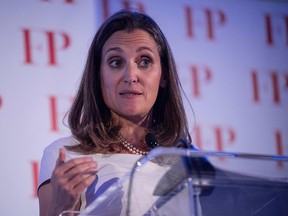 In this file photo taken on June 13, 2018 Canadian Foreign Minister Chrystia Freeland gestures as she speaks after receiving Foreign Policy's 2018 Diplomat of the Year award in Washington, DC.