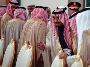 Saudi Arabia's King Salman bin Abdulaziz Al Saud takes his seat during a meeting with Russian President at the Kremlin in Moscow on October 5, 2017.