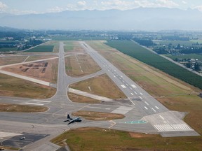 A runway from the International Abbotsford airport. Jadene Mah, a spokesperson for the Abbotsford International Airshow, said there was a pilot and four passengers on board the deHavilland Dragon Rapide when it crashed on the runway at 5:30 p.m., almost an hour after the airshow ended.