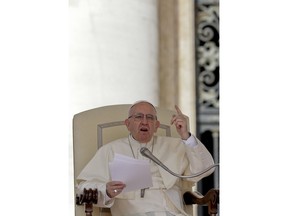 In this Wednesday, April 25, 2018 file photo Pope Francis delivers his speech during his weekly general audience, in St.Peter's Square at the Vatican. The Vatican said Thursday Aug. 2, 2018  that Pope Francis had changed the Catechism of the Catholic Church about the death penalty, saying it can never be sanctioned because it "attacks" the inherent dignity of all humans.