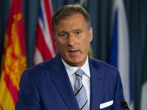 Maxime Bernier announces he will leave the Conservative party during a news conference in Ottawa, Thursday August 23, 2018.
