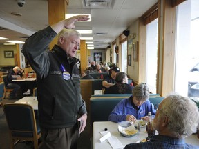 Republican gubernatorial candidate Mead Treadwell speaks to diners at a restaurant Tuesday, Aug. 21, 2018, in Anchorage, Alaska. Voters will choose a Republican nominee to advance to what is expected to be a hard-fought battle for governor this fall. The winner advances to the general election and is expected to face incumbent Gov. Bill Walker, an independent, and former Sen. Mark Begich, a Democrat.