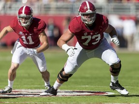 FILE - In this Oct. 22, 2016, file photo, Alabama wide receiver Gehrig Dieter (11) and offensive lineman Jonah Williams (73) look for blocks during the first half of an NCAA college football game against Texas A&M, at Bryant-Denny Stadium in Tuscaloosa, Ala. Jonah Williams was selected to the AP Preseason All-America team, Tuesday, Aug. 21, 2018.