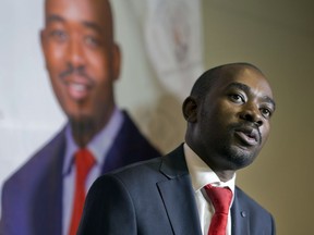 FILE - In this Thursday, Aug. 2, 2018 file photo, Zimbabwean's main opposition candidate Nelson Chamisa speaks at a news conference in Harare, Zimbabwe. Zimbabwe's main opposition party has filed a legal challenge to the results of the country's first election without Robert Mugabe on the ballot, alleging irregularities and calling for a fresh vote or for candidate Nelson Chamisa to be declared the winner.