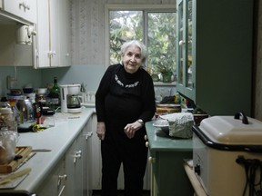 Anna Stady stands in her kitchen in Union Bay, B.C. on Thursday Aug. 2, 2018. The 95-year-old Vancouver Island woman says she shooed a black bear out of her home twice in one day last week.