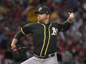 Oakland Athletics starting pitcher Brett Anderson throws during the first inning of the team's baseball game against the Los Angeles Angels on Friday, Aug. 10, 2018, in Anaheim, Calif.