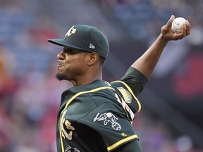 Oakland Athletics starting pitcher Edwin Jackson throws to the plate during the second inning of a baseball game against the Los Angeles Angels, Saturday, Aug. 11, 2018, in Anaheim, Calif.
