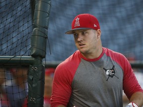 Los Angeles Angels' Mike Trout walks out of the batting cage during practice for a baseball game against the Houston Astros, Friday, Aug. 24, 2018, in Anaheim, Calif.