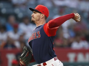 Los Angeles Angels starting pitcher Andrew Heaney throws against the Houston Astros during the first inning of a baseball game, Friday, Aug. 24, 2018, in Anaheim, Calif.