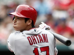 Los Angeles Angels' Shohei Ohtani (17) bats against the Texas Rangers during the first inning of a baseball game Sunday, Aug. 19, 2018, in Arlington, Texas.