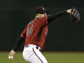 Arizona Diamondbacks pitcher Patrick Corbin throws in the first inning of a baseball game against the Philadelphia Phillies, Wednesday, Aug. 8, 2018, in Phoenix.