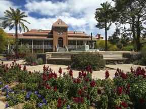 This Thursday, April 6, 2017 photo shows Old Main on the University of Arizona campus in Tucson, Ariz. The University of Arizona has accepted hundreds of thousands of dollars in funding over the past two decades from a foundation infamous for promoting research linking race and intelligence. Records reviewed by The Associated Press show a psychology professor on the Tucson campus has received money from the Maryland-based Pioneer Fund even after other universities and organizations, including white nationalist groups, stopped receiving its support.