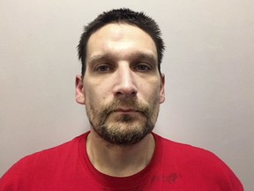 This April 2018 identification photo released by the New Hampshire Attorney General shows Douglas Heath, killed in a shootout with police, Monday, Aug. 20, 2018 in Rochester, N.H. Heath, 38, was wanted on several outstanding warrants, including one for trafficking narcotics and another for fleeing from a Maine trooper. (New Hampshire Attorney General via AP)