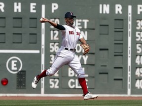 Boston Red Sox shortstop Xander Bogaerts throws out Tampa Bay Rays' Matt Duffy during the first inning of a baseball game Sunday, Aug. 19, 2018, in Boston.
