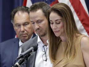 Jeanne Bernstein, right, and her husband Gideon, parents of murder victim Blaze Bernstein, speak during a news conference as Orange County District Attorney Tony Rackauckas, left, looks on Thursday, Aug. 2, 2018, in Santa Ana, Rackauckas, said Thursday they will file a hate crime sentencing enhancement against 21-year-old Samuel Woodward in the murder of 19-year-old sophomore Blaze Bernstein.