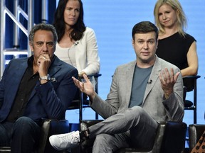 Taran Killam, front right, a cast member in the Disney ABC television series "Single Parents," answers a question as fellow cast member Brad Garrett, front left, executive producer Katherine Pope, top left, and co-creator/executive producer JJ Philbin look on during the 2018 Television Critics Association Summer Press Tour, Tuesday, Aug. 7, 2018, in Beverly Hills, Calif.