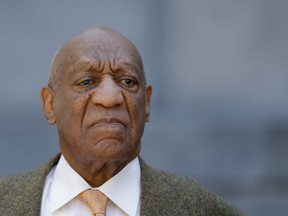 FILE - In this April 23, 2018 file photo, Bill Cosby departs after his sexual assault trial at the Montgomery County Courthouse in Norristown, Pa. The board of visitors of The College of William & Mary has voted to rescind an honorary degree awarded to comedian and actor Cosby. The board issued a statement Friday, Aug. 10, 2018, saying since it awarded the Masters of Arts degree in 1993, "information came to light and was confirmed that Mr. Cosby engaged in abhorrent conduct antithetical to our university's core values."