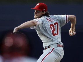 Philadelphia Phillies starting pitcher Aaron Nola works against a San Diego Padres batter during the first inning of a baseball game Saturday, Aug. 11, 2018, in San Diego.
