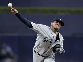 Seattle Mariners starting pitcher Felix Hernandez works against a San Diego Padres batter during the first inning of a baseball game, Tuesday, Aug. 28, 2018, in San Diego.