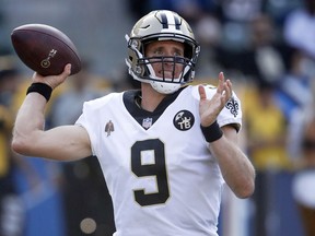 New Orleans Saints quarterback Drew Brees throws a pass during the first half of the team's NFL preseason football game against the Los Angeles Chargers on Saturday, Aug. 25, 2018, in Carson, Calif.