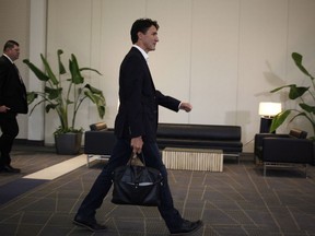 Prime Minister Justin Trudeau arrives at the Vancouver Island Conference Centre during day two of the Liberal cabinet retreat in Nanaimo, B.C., on Wednesday, August 22, 2018.