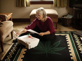 Cannabis user and grandmother Carol Francey, also known as Granny Grass is photographed printing a letter to the editor from her home in Victoria, B.C., on Monday, August 20, 2018.