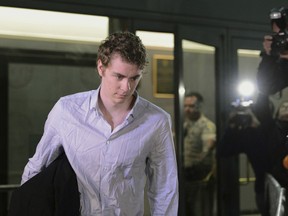 FILE - In this Sept. 2, 2016, file photo, Brock Turner leaves the Santa Clara County Main Jail in San Jose, Calif. An appeals court has rejected the former Stanford University swimmer's bid for a new trial and upheld his sexual assault conviction. The three judge panel of the 6th District Court of Appeal ruled unanimously Wednesday, Aug. 8, 2018, that Brock Turner received a fair trial.