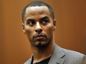 FILE - In this Feb. 20, 2014, file photo, former NFL football player Darren Sharper appears in Los Angeles Superior Court in Los Angeles. The disgraced former NFL star has renewed efforts to get a reduction in his 18-year federal sentence for drugging and raping women. Lawyers for Sharper, who lost a federal appeal more than a year ago, went back to U.S. District Court in New Orleans this week, filing a memorandum arguing that he was not adequately advised by his trial lawyers on the consequences of his 2016 guilty plea.