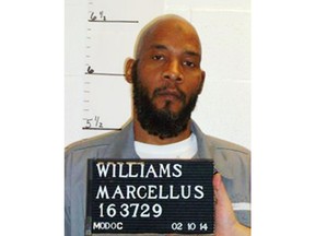 FILE - This February 2014 file photo provided by the Missouri Department of Corrections shows death row inmate Marcellus Williams. Missouri Gov. Mike Parson will allow a panel of five former judges to review the death penalty case of Williams, whose guilt in the stabbing death of a former newspaper reporter, has been called into question by DNA evidence. A spokeswoman for Parson on Monday, Aug. 6, 2018, confirmed the panel has been given the go-ahead to proceed. (Missouri Department of Corrections via AP, File)